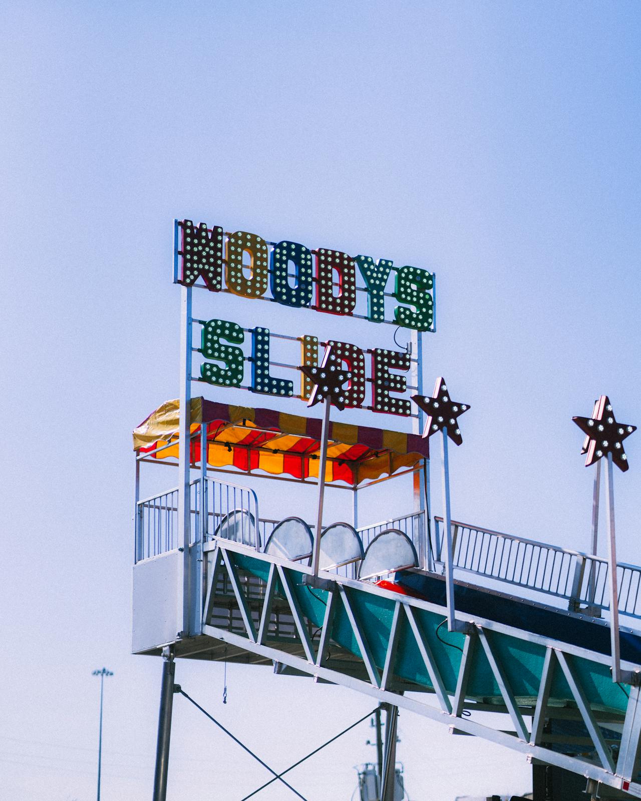 Vibrant carnival slide at a Houston fair, perfect for fun and entertainment imagery.